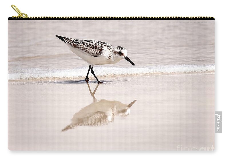 On The Road Again Zip Pouch featuring the photograph Reflective Sandpiper by Tony Lee