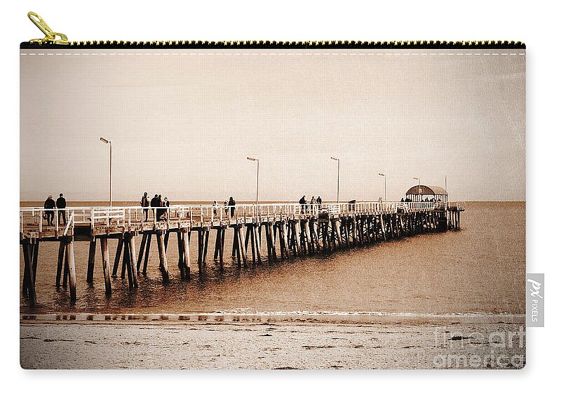 Jetty Zip Pouch featuring the photograph Retro grunge vintage style sepia people on jetty pier boardwalk. by Milleflore Images