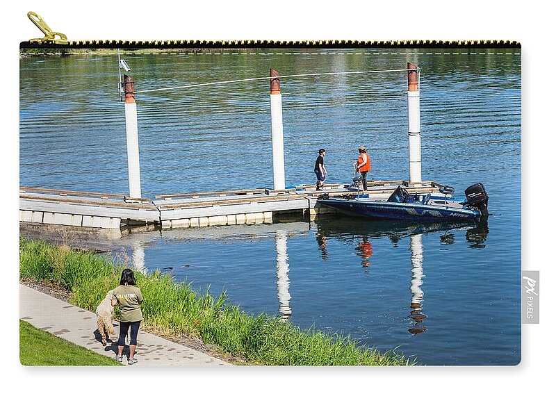 Riverfront Park Boat Ramp Zip Pouch featuring the photograph Riverfront Park Boat Ramp by Tom Cochran