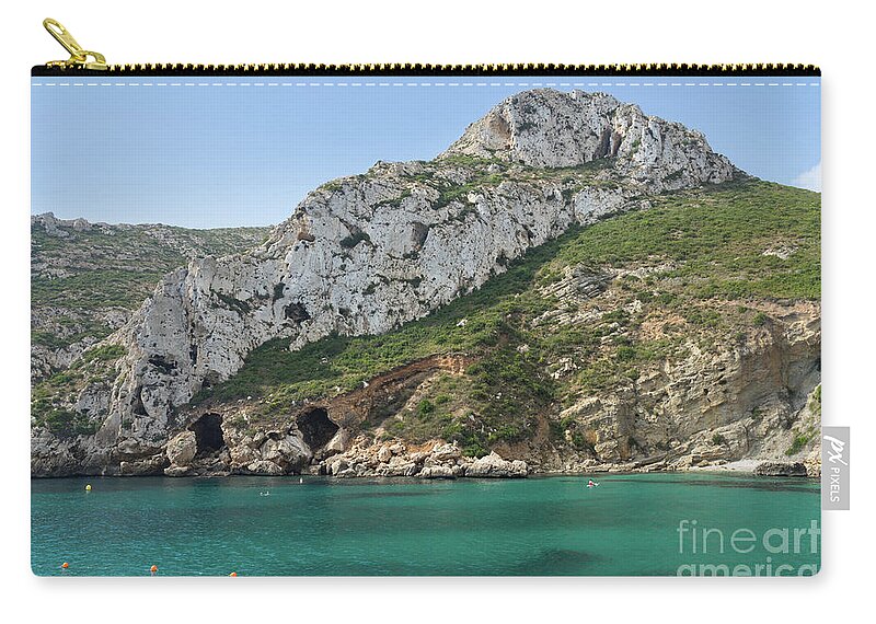 Mediterranean Sea Zip Pouch featuring the photograph Rocks and turquoise sea water by Adriana Mueller