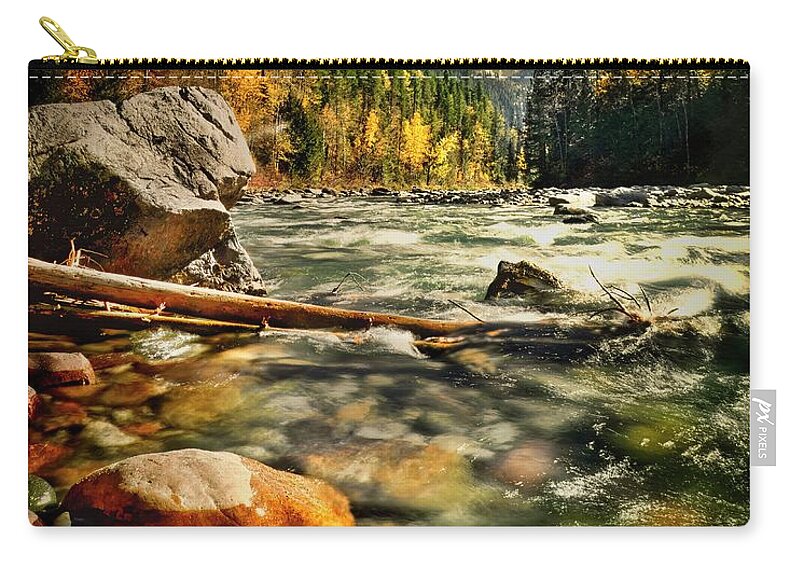 Sunset Zip Pouch featuring the photograph Rocky Mountain Sunset by Thomas Nay
