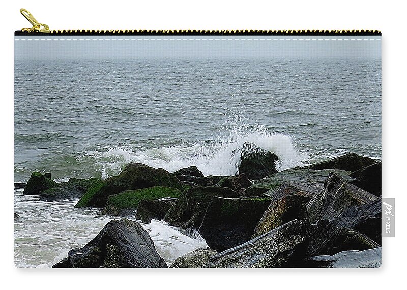Waves Carry-all Pouch featuring the photograph Rocky Shores of the Atlantic Ocean in Cape May New Jersey by Linda Stern