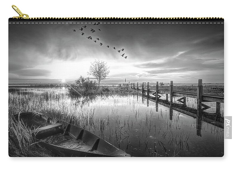 Birds Zip Pouch featuring the photograph Rowboat in the Marsh at Sunset in Black and White by Debra and Dave Vanderlaan