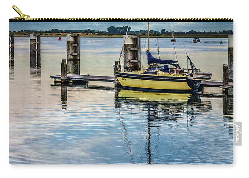 Boats Zip Pouch featuring the photograph Sailboat in a Peaceful Harbor by Debra and Dave Vanderlaan