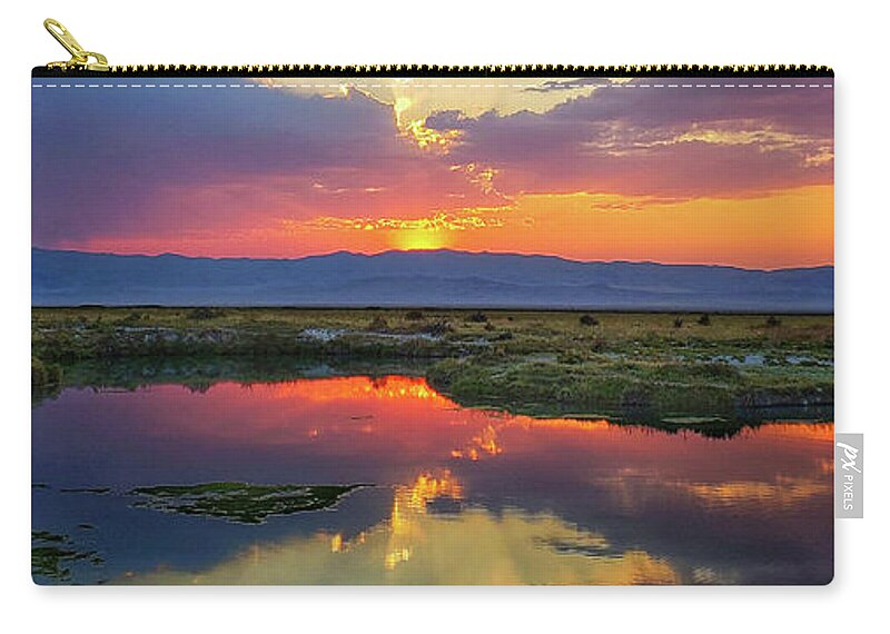 Mountain Zip Pouch featuring the photograph Salt Spring Showdown by Go and Flow Photos