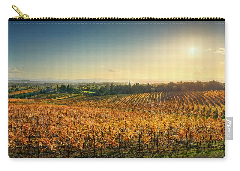 Chianti Zip Pouch featuring the photograph San Gusme, Chianti vineyards at sunset. Tuscany by Stefano Orazzini