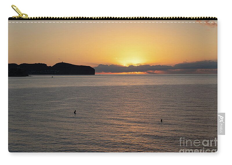 Mediterranean Sea Zip Pouch featuring the photograph Sea water and golden sky at sunrise, Mediterranean coast by Adriana Mueller