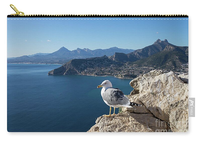 Seagull Zip Pouch featuring the photograph Seagull watches the Mediterranean Sea in Spain by Adriana Mueller