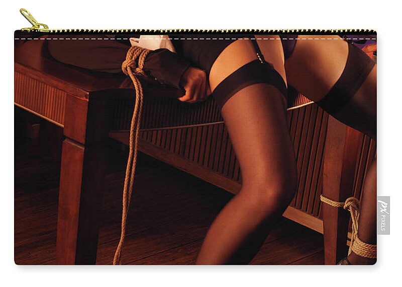 Bondage Zip Pouch featuring the photograph Sexy Asian Woman Tied with Ropes to a Table by Maxim Images Exquisite Prints