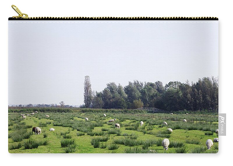 Netherlands Zip Pouch featuring the photograph Sheep in the pasture by Kaoru Shimada