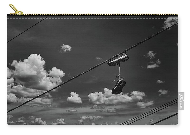 Shoes Zip Pouch featuring the photograph Shoe Tossing by Bob Orsillo
