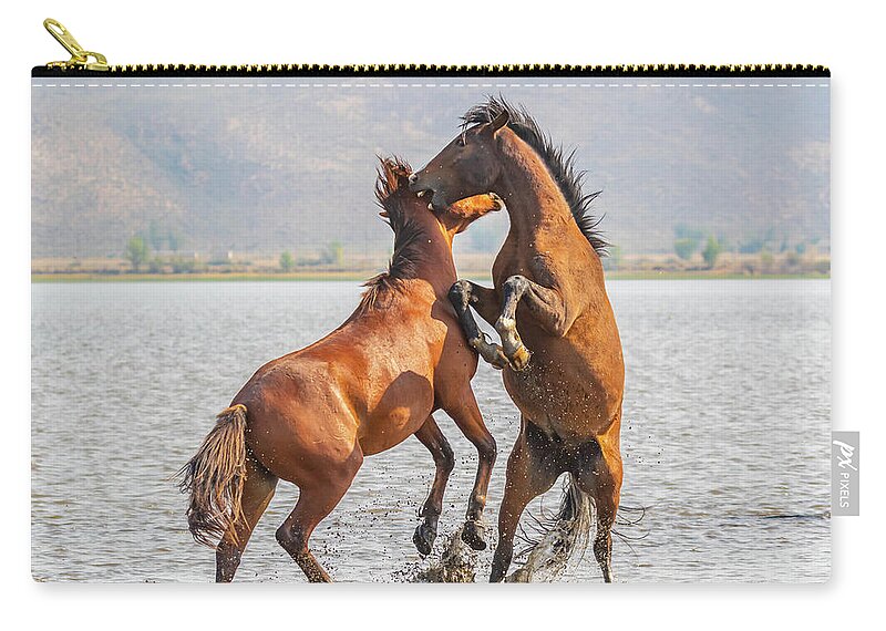 Nevada Zip Pouch featuring the photograph Shoreline Fight by Marc Crumpler