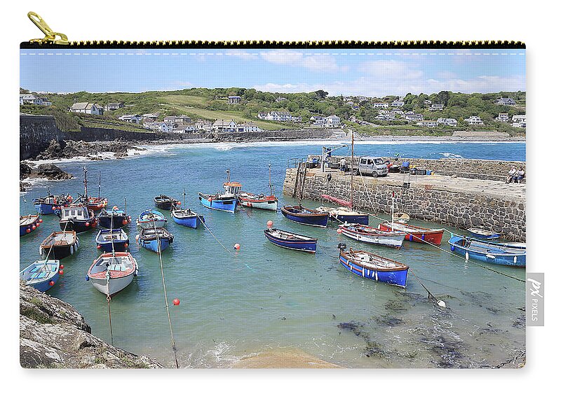 Coverack Zip Pouch featuring the photograph The small harbour Coverack, Cornwall. by Tony Mills