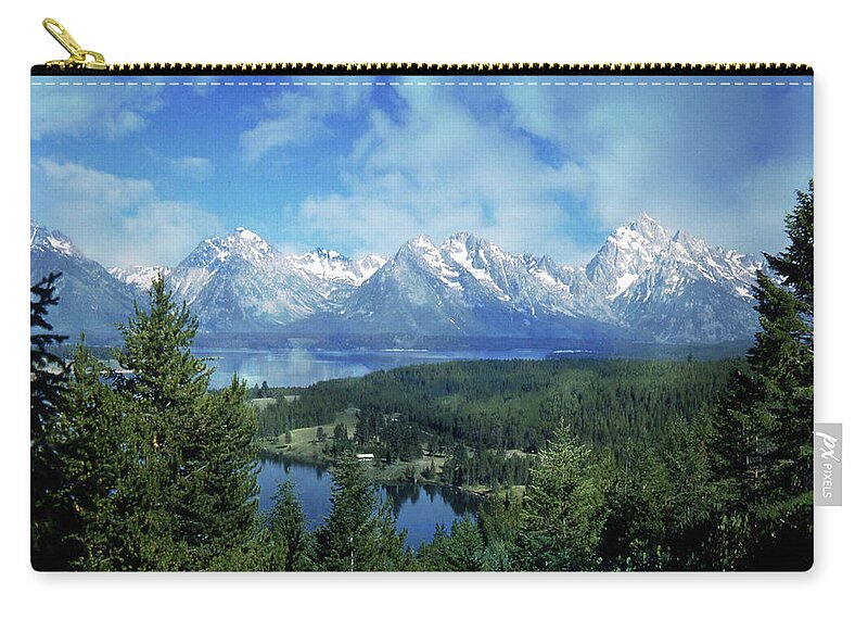 Clouds Zip Pouch featuring the photograph Snow Covered Grand Tetons by Russel Considine
