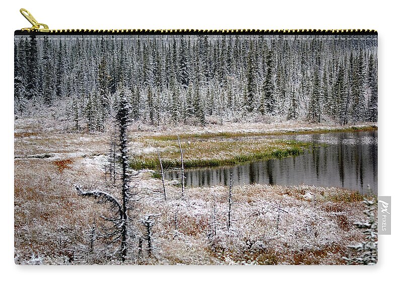 George Parks Highway Zip Pouch featuring the photograph Snowy Evergreens and Pond by Connie Fox