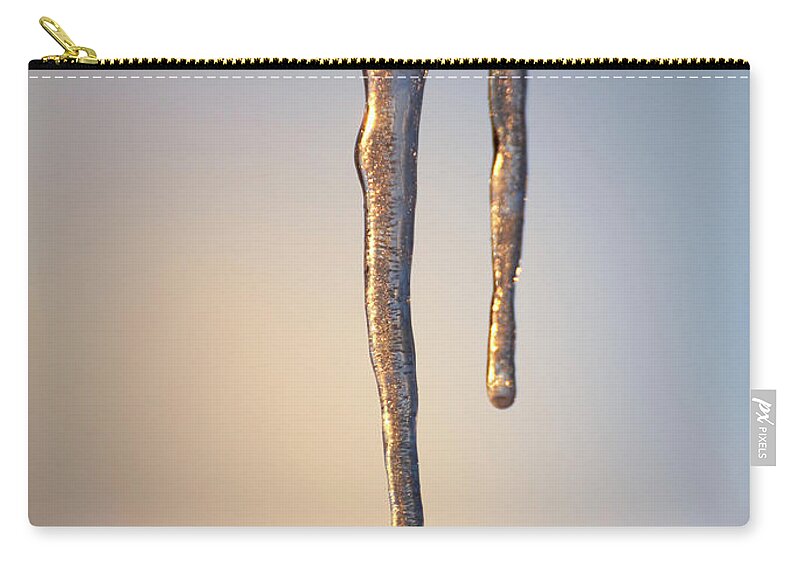 Icicle Zip Pouch featuring the photograph Sparkling Icicle At Sunset by Mikhail Kokhanchikov
