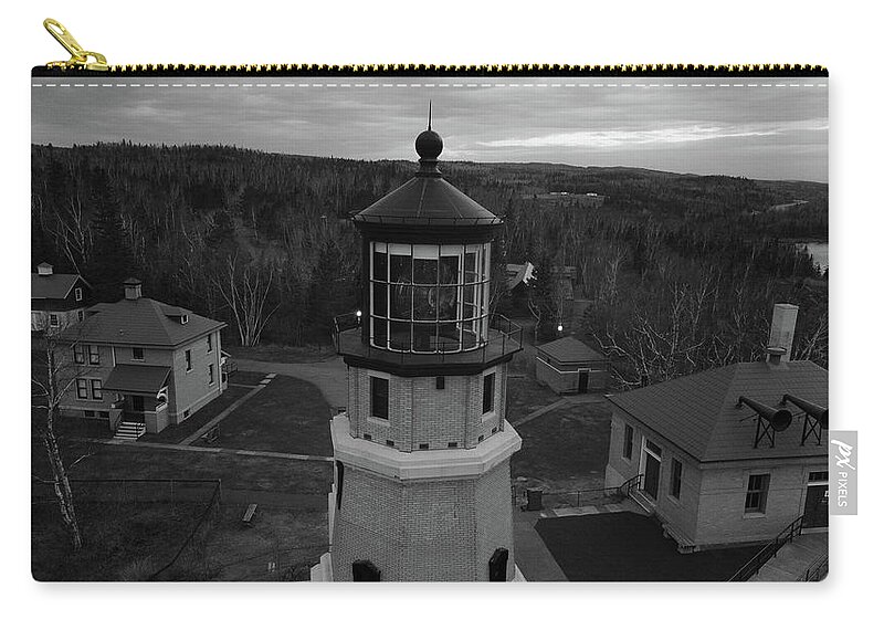 Split Rock Lighthouse Minnesota Zip Pouch featuring the photograph Split Rock Lighthouse in Minnesota along Lake Superior in black and white by Eldon McGraw