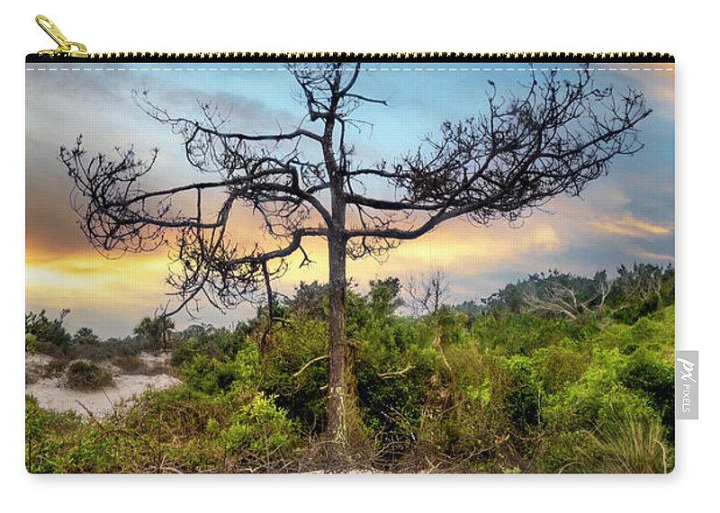 Tree Zip Pouch featuring the photograph Standing on the Marsh Dunes by Debra and Dave Vanderlaan