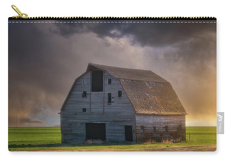 Kansas Zip Pouch featuring the photograph Standing Up To the Storm by Darren White