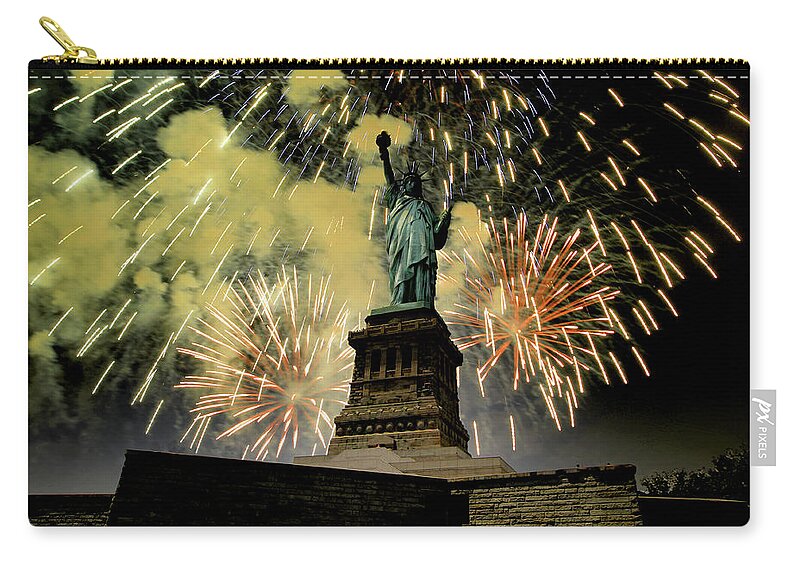 Statue Of Liberty Zip Pouch featuring the photograph Statue of Liberty with fire works by Montez Kerr