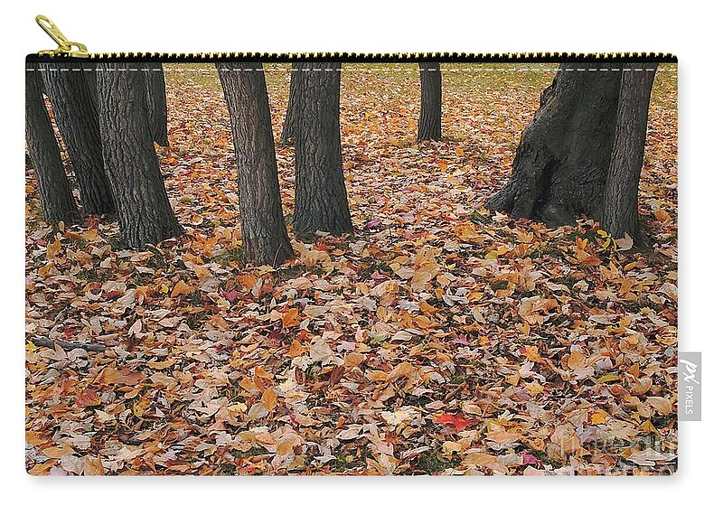 Autumn Zip Pouch featuring the photograph Stepping on the Leaves by Randy Pollard