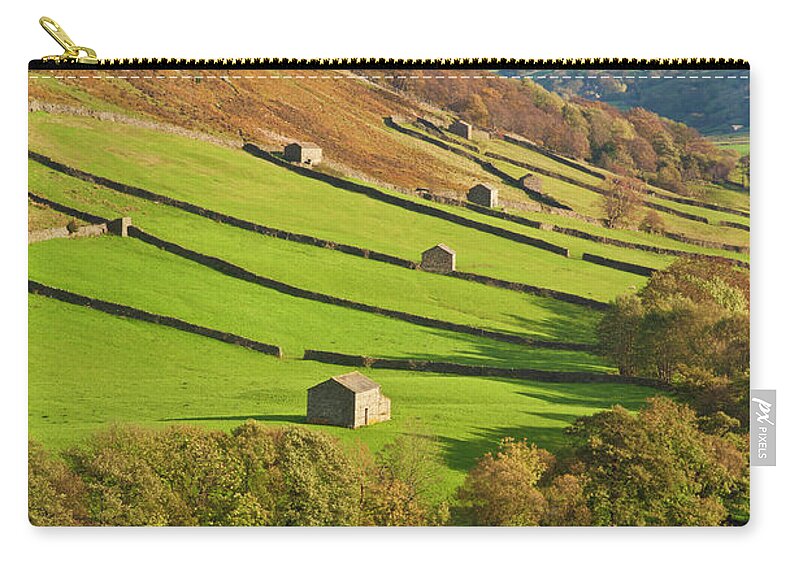 Yorkshire Dales National Park Zip Pouch featuring the photograph Stone barns in Swaledale, Yorkshire Dales, England by Neale And Judith Clark