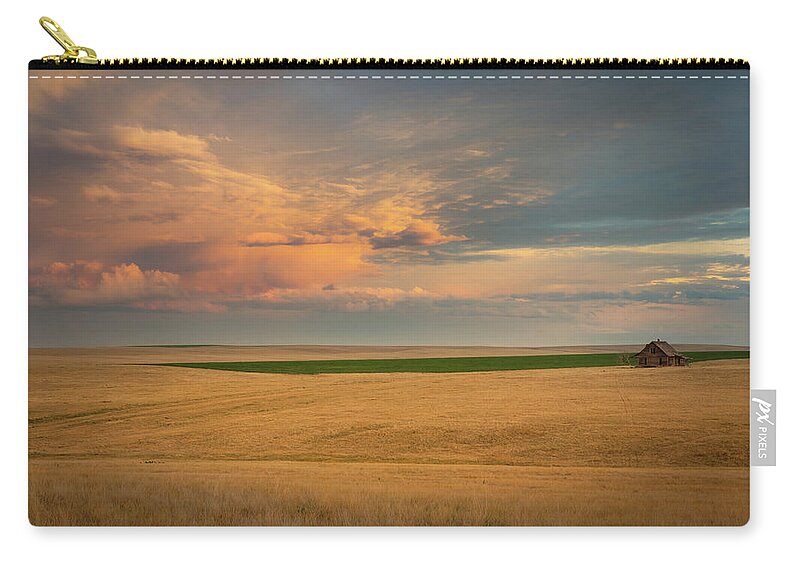 Colorado Zip Pouch featuring the photograph Storm on the Range by Kevin Schwalbe