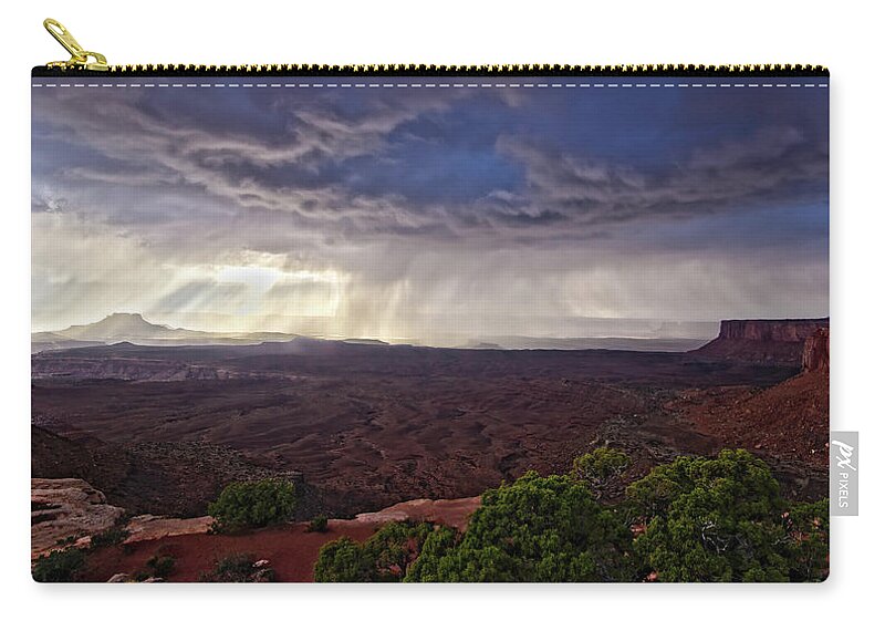 America Zip Pouch featuring the photograph Storm over Grand View Point Overlook in canyonlands natio by Jean-Luc Farges