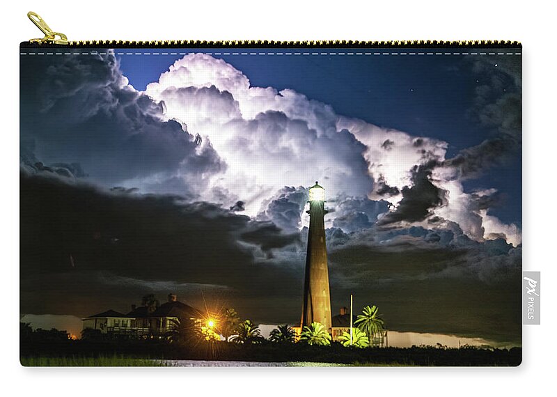 Bolivar Lighthouse Zip Pouch featuring the photograph Stormy Lighthouse by Jerry Connally