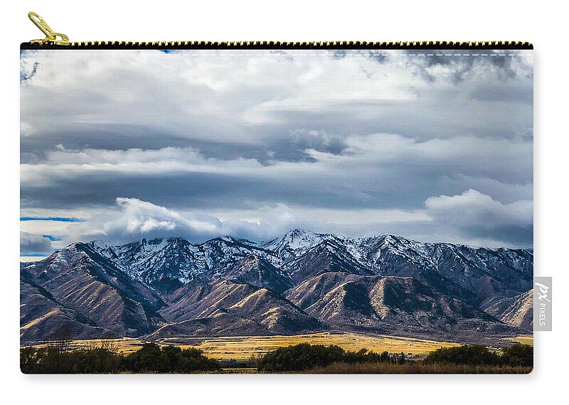 Wellsville Mountains Zip Pouch featuring the photograph Stormy Mountains by Kevin Schwalbe