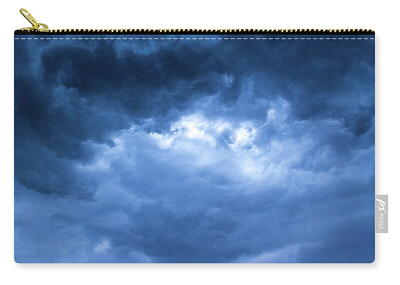 Sky Carry-all Pouch featuring the photograph Stormy sky with dramatic clouds by Viktor Wallon-Hars