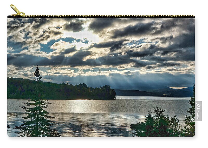 Sun Zip Pouch featuring the photograph Sun Rays and Storm Clouds Over Rangeley Maine by Russel Considine