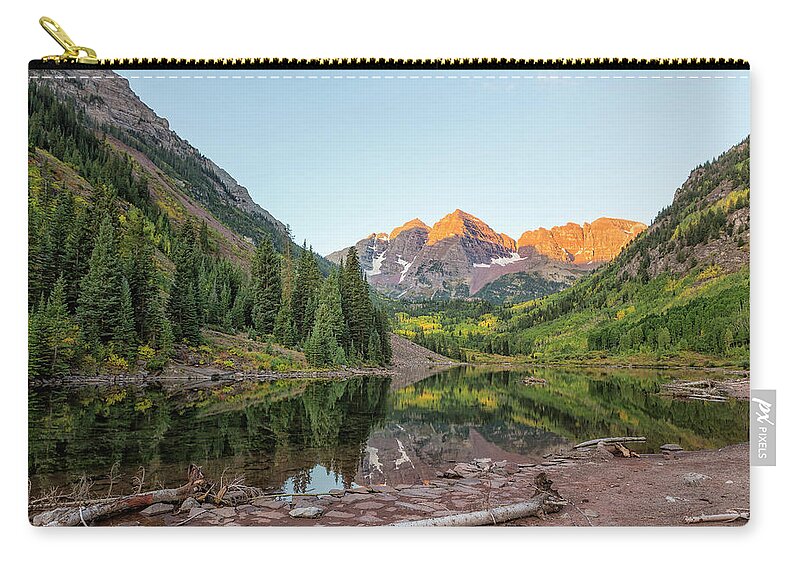 Maroon Bells Zip Pouch featuring the photograph Sunlight Hitting the Peaks at Maroon Bells by Belinda Greb
