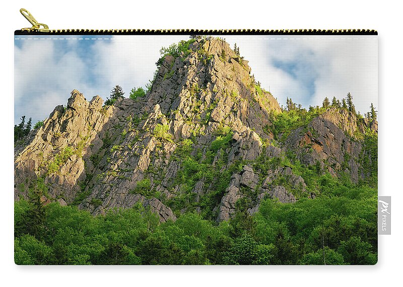 New Hampshire Zip Pouch featuring the photograph Sunlight plays on a Stone Pinnacle in Dixville Notch, New Hampshire by William Dickman