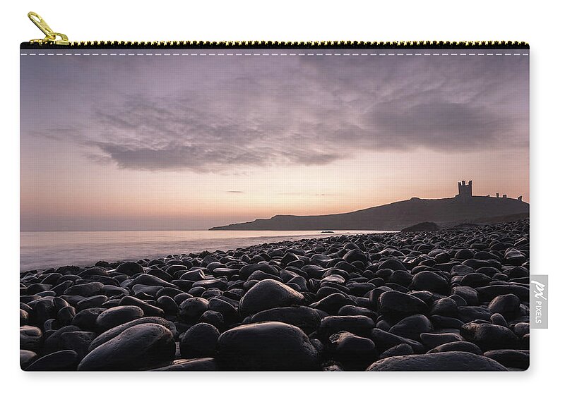Landscape Zip Pouch featuring the photograph Sunrise at Dunstanburgh Castle, Northumberland, England, UK by Sarah Howard