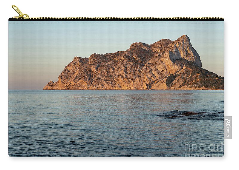 Mediterranean Sea Zip Pouch featuring the photograph Sunrise at Penon de Ifach in Calpe, Mediterranean coast by Adriana Mueller