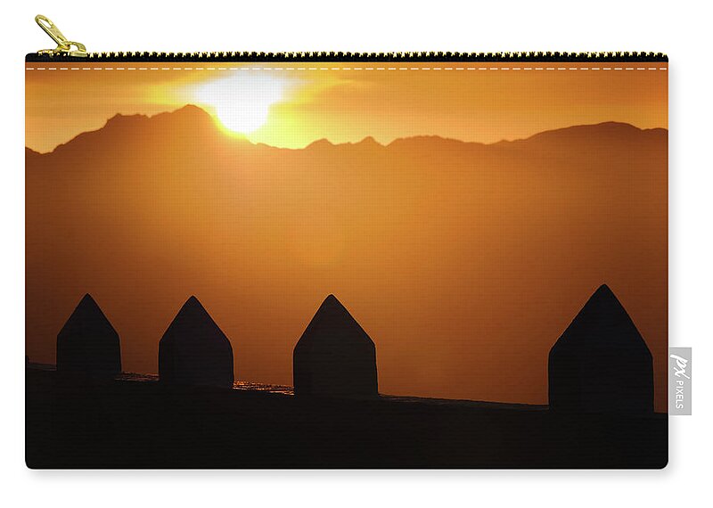 Sunrise Zip Pouch featuring the photograph Sunrise over the Sierra Tejjeda by Gary Browne