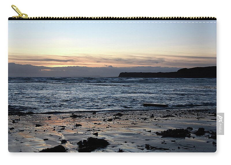 Kimmeridge Zip Pouch featuring the photograph Sunset at Kimmeridge Bay Dorset England by Loren Dowding