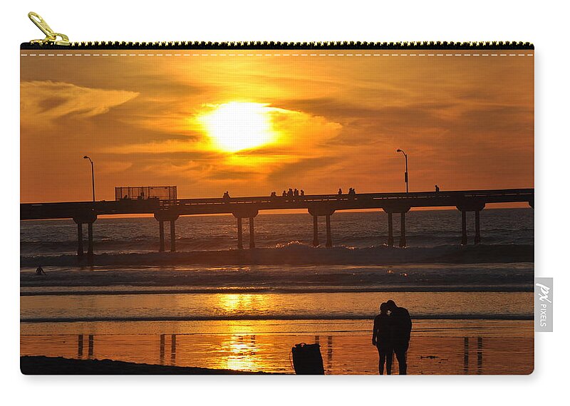 Pier Zip Pouch featuring the photograph Sunset at the Pier by Mike Helland