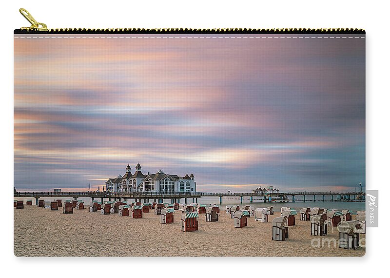 Sellin Zip Pouch featuring the photograph Sunset at the Sellin Pier 2 by Henk Meijer Photography