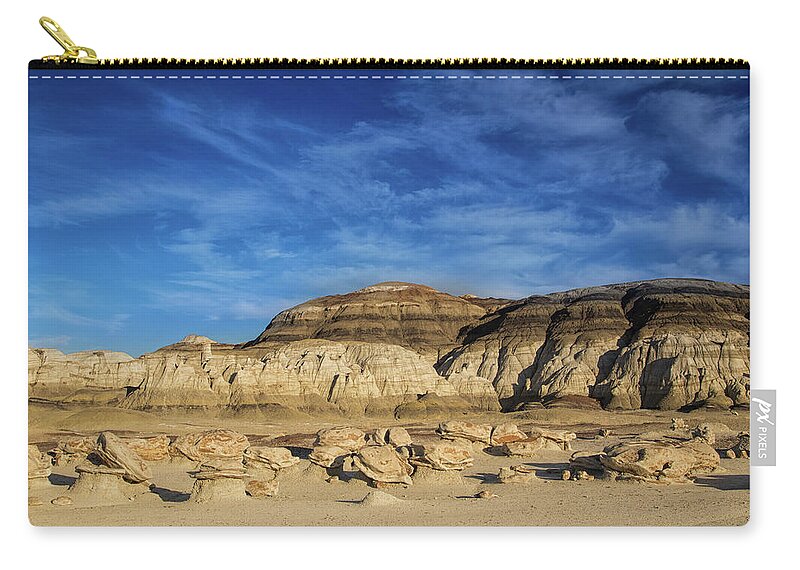 Bisti Badlands Zip Pouch featuring the photograph Sunset in the Bisti Badlands by Kunal Mehra
