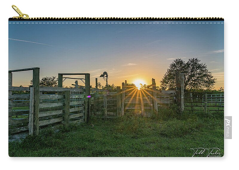 Indiantown Zip Pouch featuring the photograph Sunset Over Cow Town by Todd Tucker