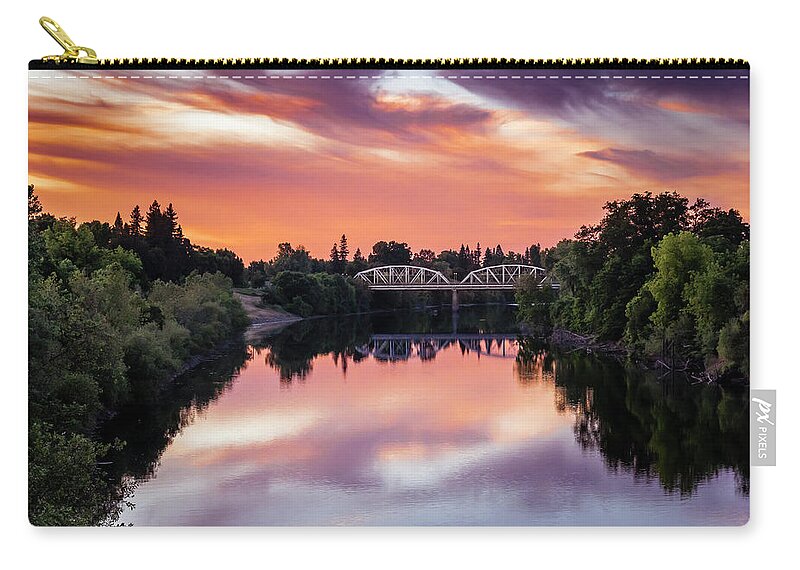 Sunset Zip Pouch featuring the photograph Sunset over the American River by Gary Geddes
