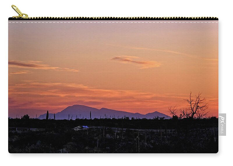 Sky Zip Pouch featuring the photograph Sunset over the Valley of the Fires by George Taylor