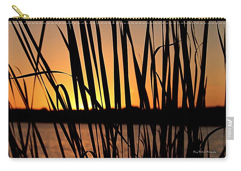 Sunset Carry-all Pouch featuring the photograph Sunset Through the Reeds by Mary Walchuck