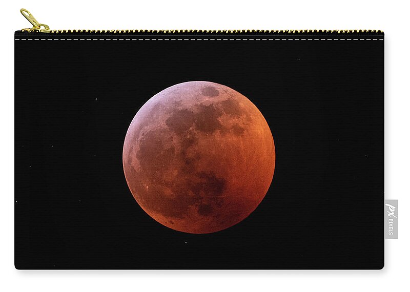 Astrophotography Zip Pouch featuring the photograph Super Blood Wolf Moon of January 20, 2019 by Nancy Gleason