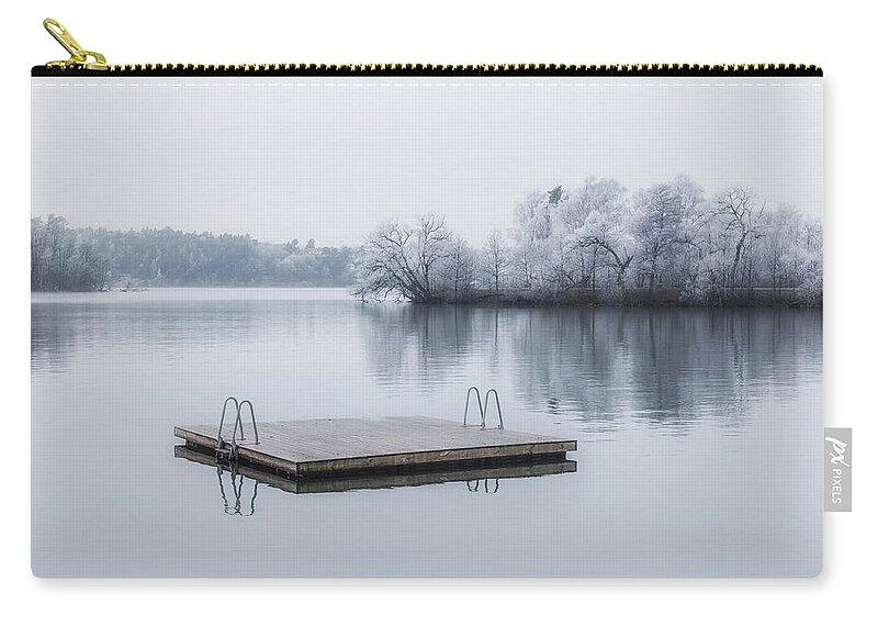 Swim Zip Pouch featuring the photograph Swim Raft in Winter Landscape by Nicklas Gustafsson