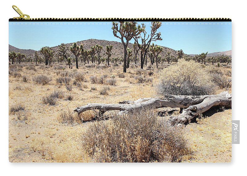 Trees Zip Pouch featuring the photograph The Bones of a Joshua Tree by Robert Carter