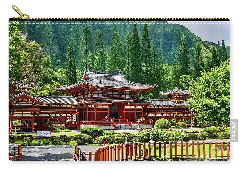 Buddhist Zip Pouch featuring the photograph The Byodo-In Temple by Diana Mary Sharpton