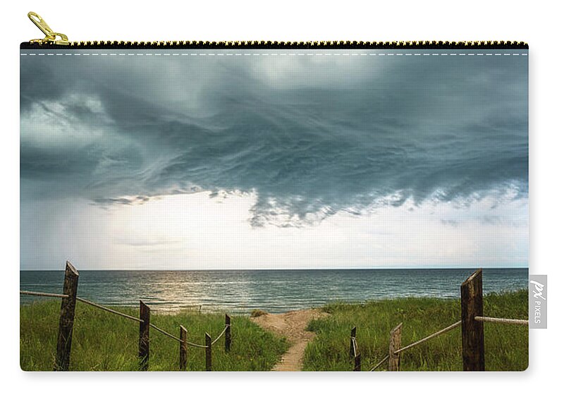 Storm Zip Pouch featuring the photograph The Clearing Storm by Nate Brack